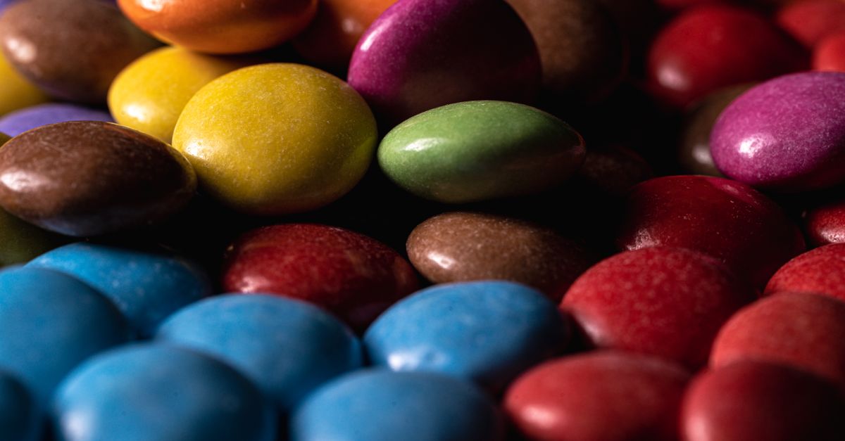 Vibrant close-up of colorful candy shells, perfect for sweet treats themes.